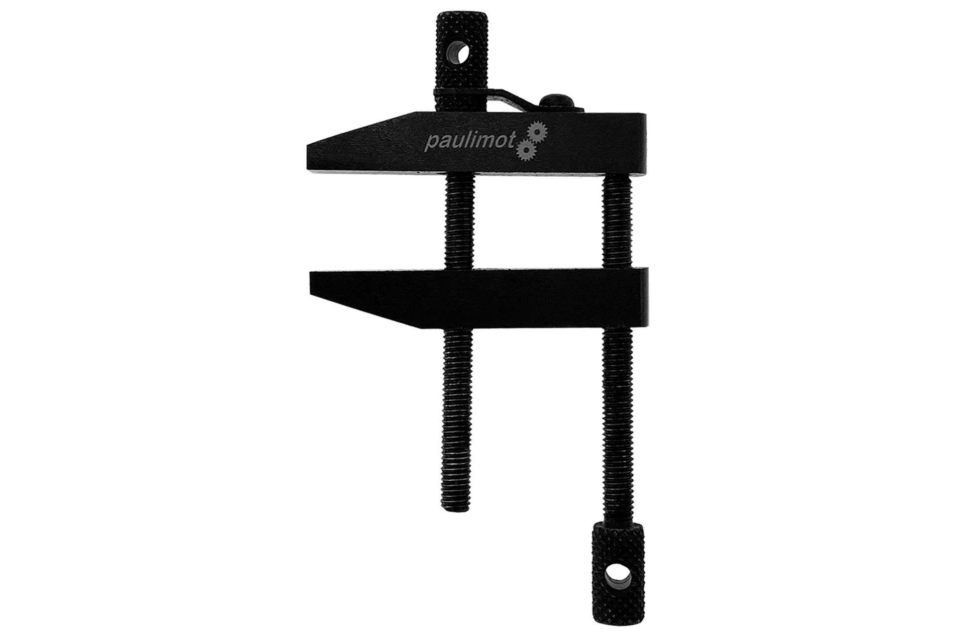 Black screw clamp 50mm Black parallel screw clamp (50mm) with two jaws and spindles. Upper jaw block with "paulimot" lettering. Tool for fixing the workpiece.