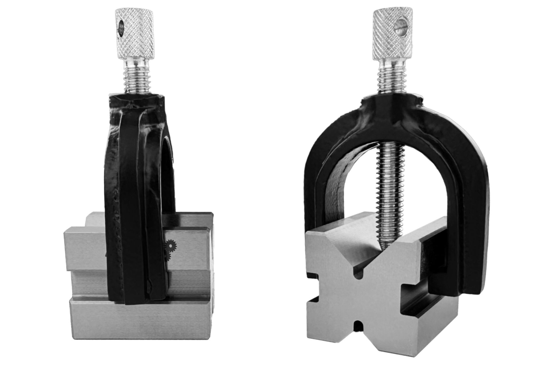 Prism pairs with clamping brackets Two pairs of prisms with clamping brackets, made of steel, with V-groove for holding round material. Detailed view.